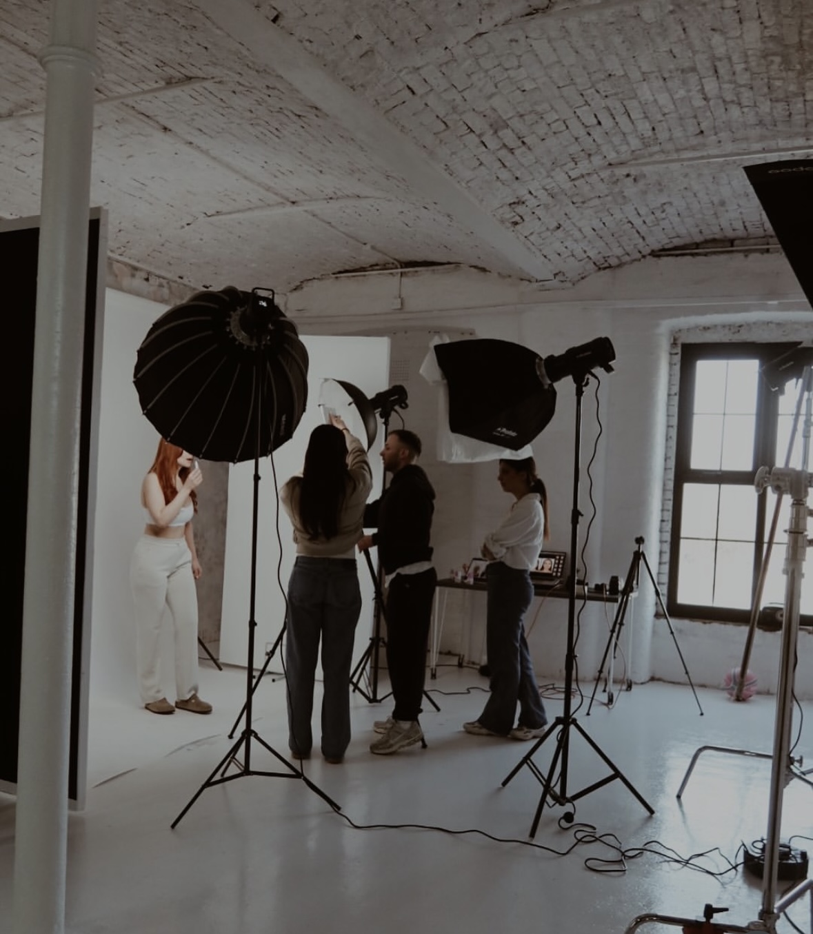 Avela team on a studio shoot — lighting setup and backdrop